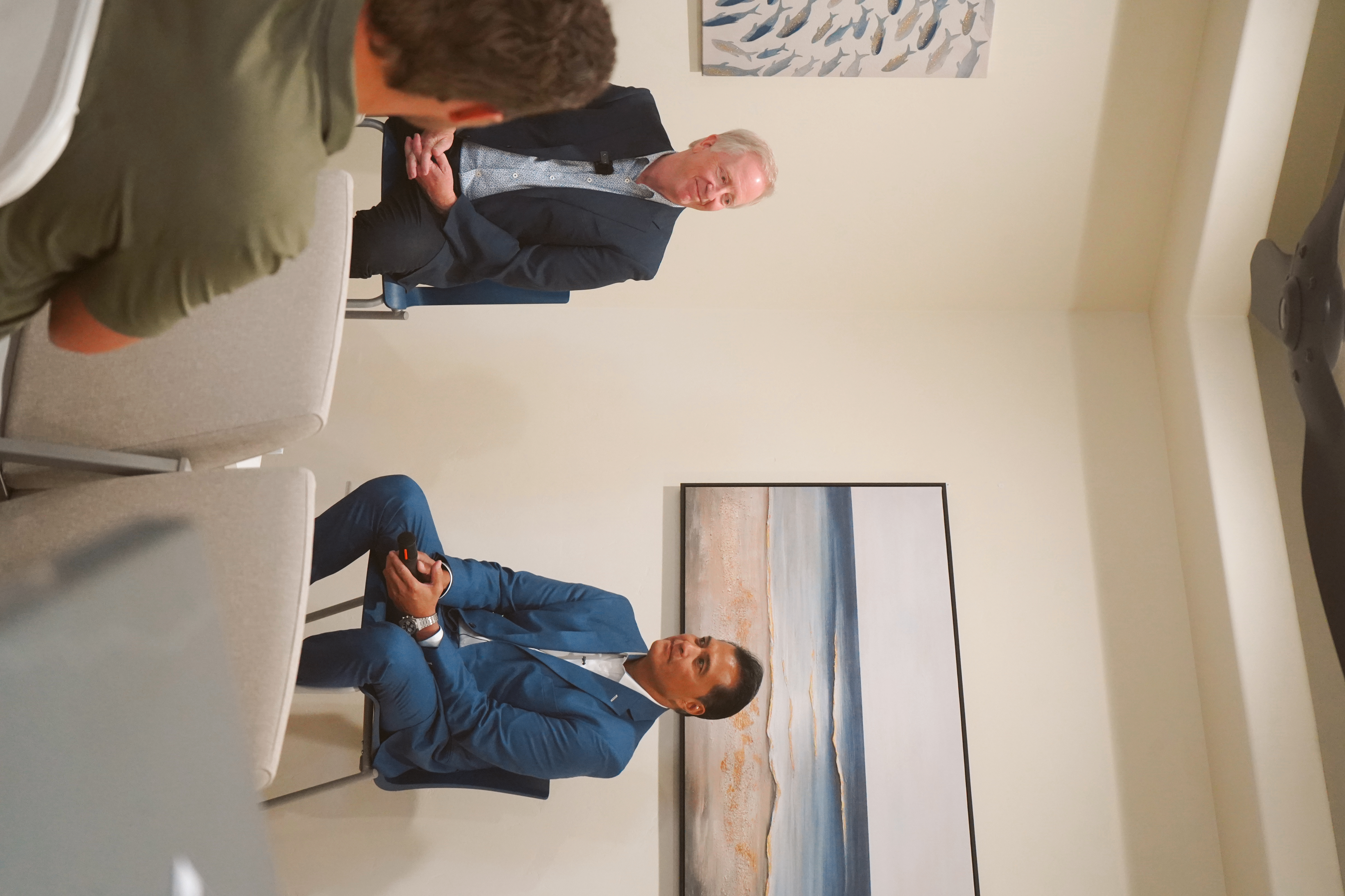 Medical staff at 5D Cancer Services grand opening educational panel